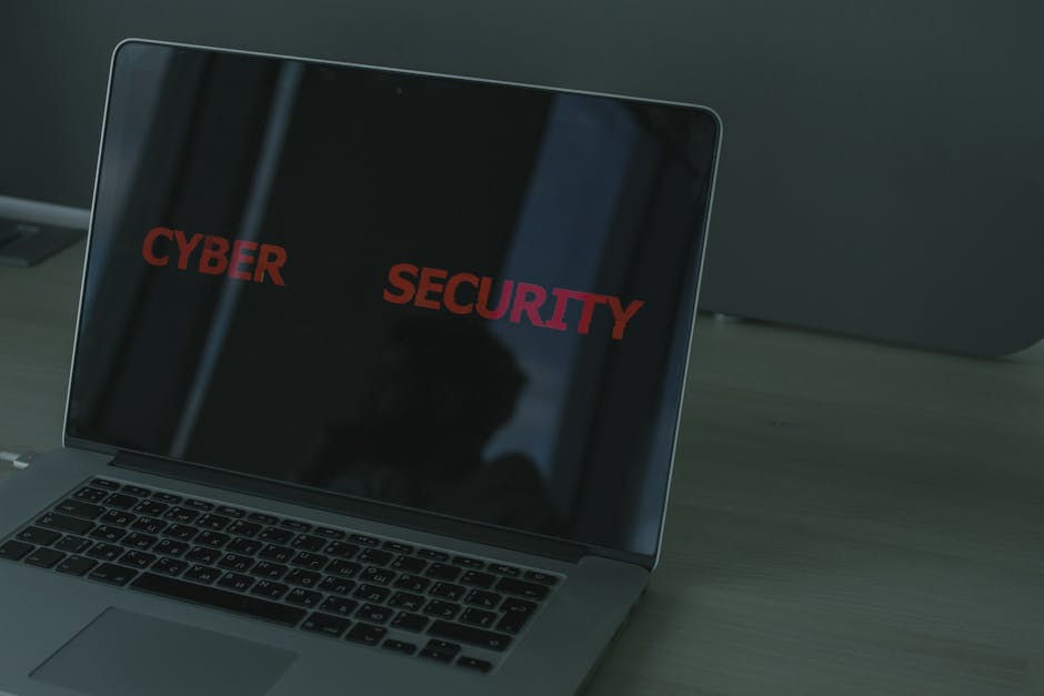 Padlock and laptop representing UK password manager security