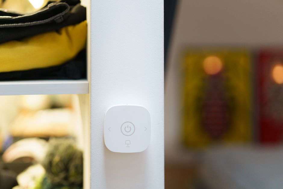 Smart home hub device in a modern living room